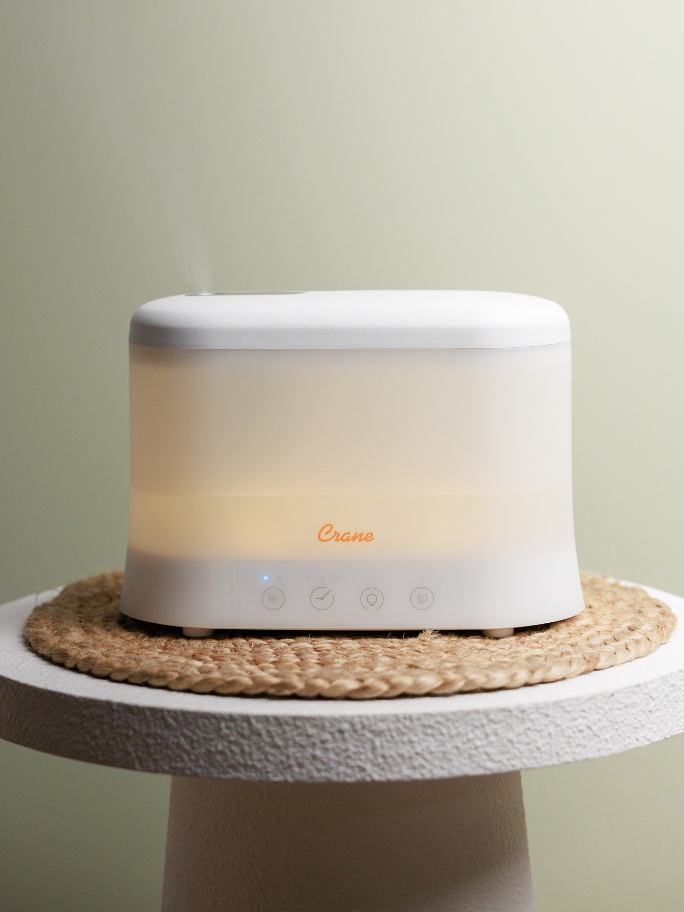Crane top fill humidifier with soft yellow light