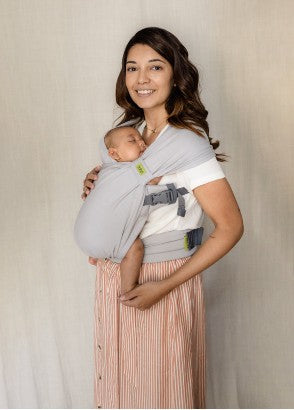 Mum wearing young sleeping baby in a grey Boba bliss baby carrier