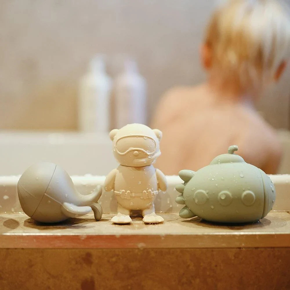 Row of silicon bath toys - whale, diver and submarine