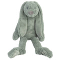 Green plush bunny toy on a white background
