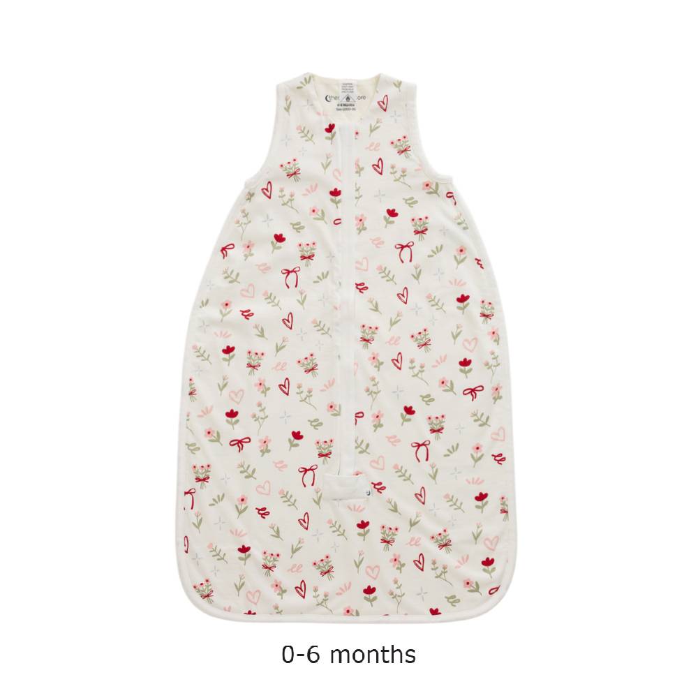 Floral print baby sleeping bag on a white background