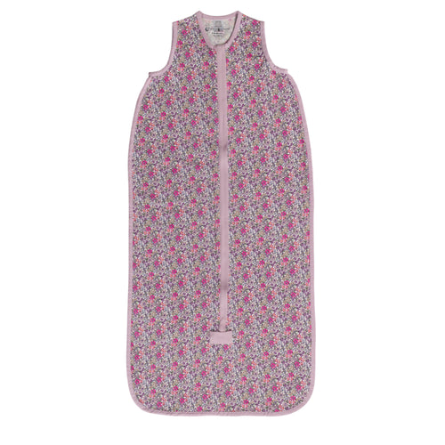 Sleeveless sleeping bag with pink and purple florals, on a white background
