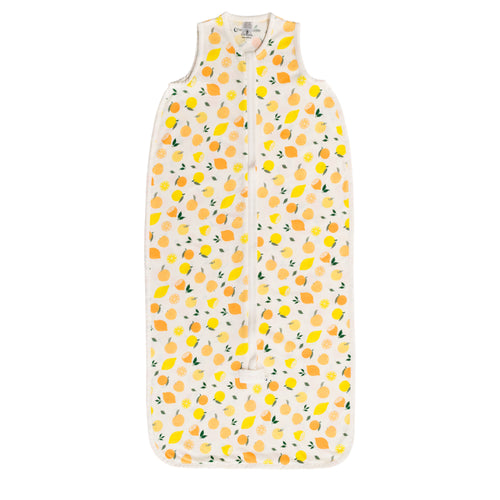 Sleeveless sleeping bag with lemons and oranges on white, on a white background