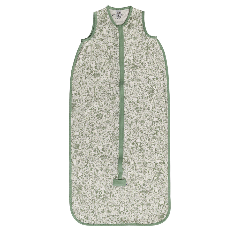 Green woodland print Sleeveless sleeping bag on a white background