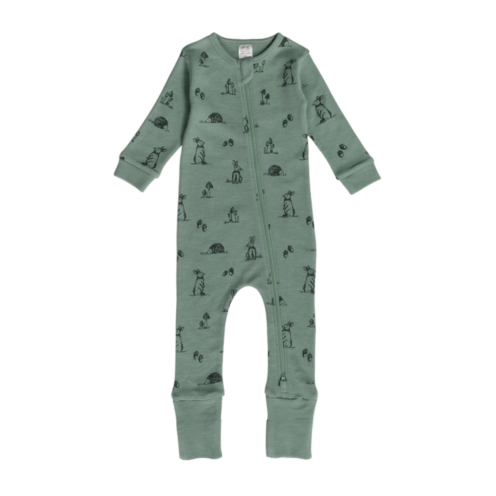 Green Forest print merino zipsuit on a white background