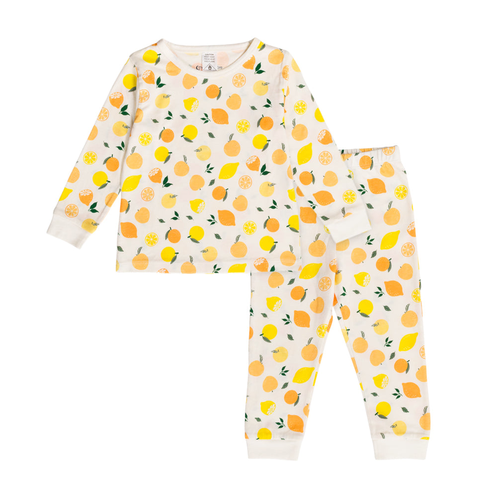 Cotton lemon and orange print pyjamas on a white background