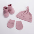 Set of Merino Booties, Beanies and Mittens in Pink on a white background