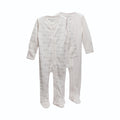 2 footed merino zipsuits, one cream, one cream with elephants on a white background
