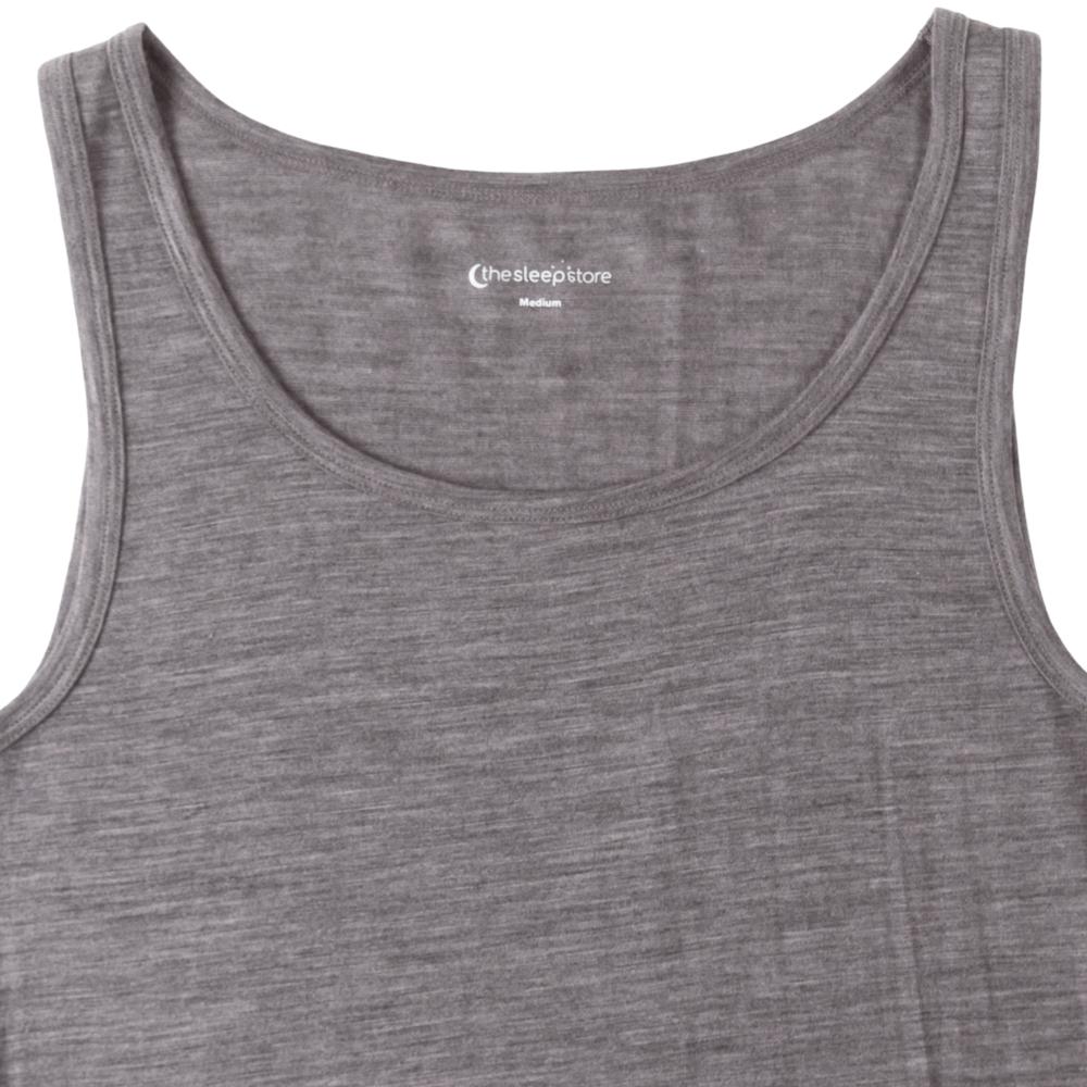 A close-up of a gray sleeveless tank top showing the inner neckline with the Sleep Store brand label.