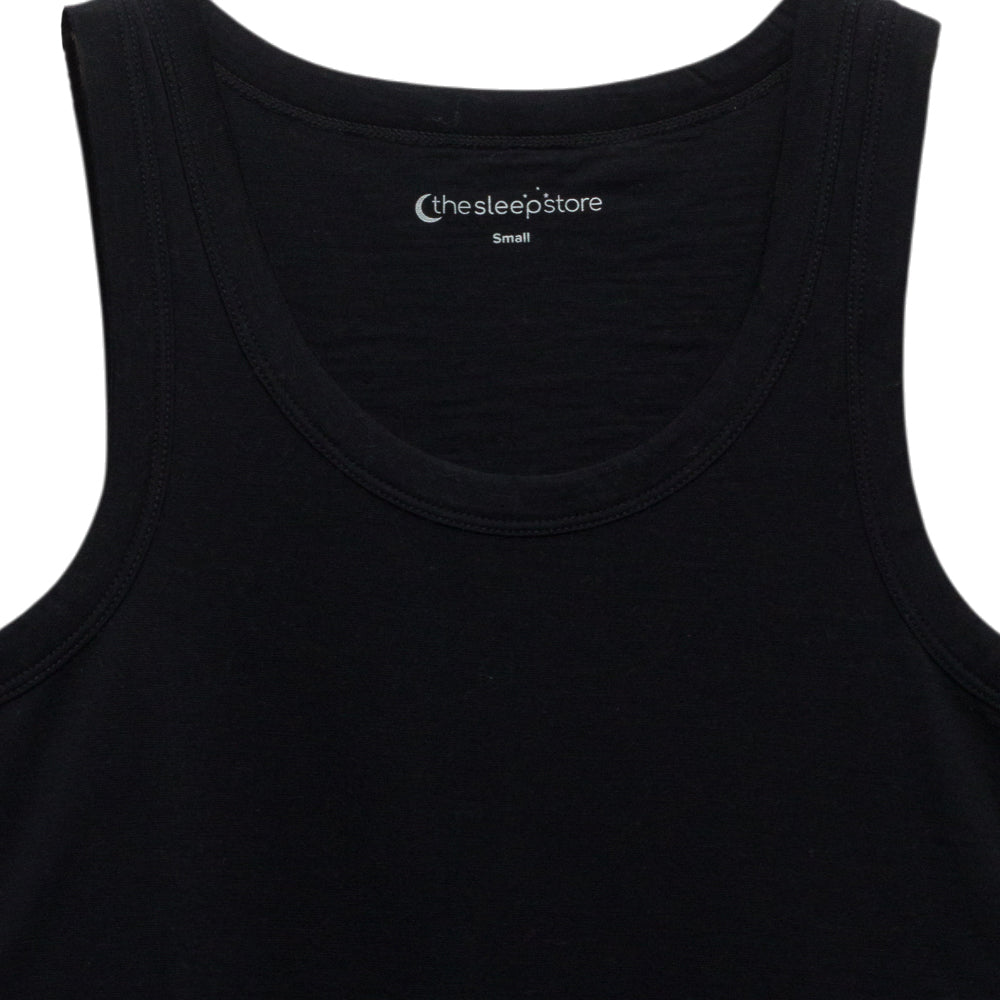 Close-up of a black sleeveless tank top showing the inner neck label 