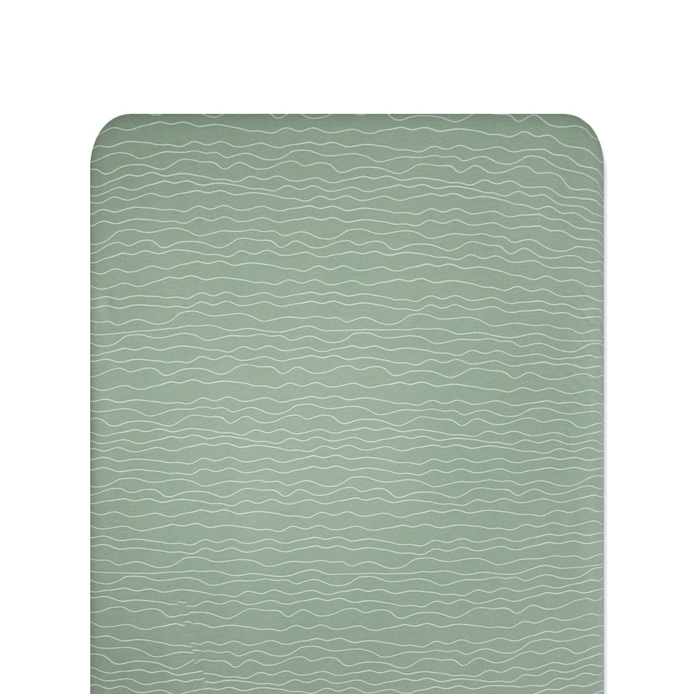 Green waves fitted sheet on white background