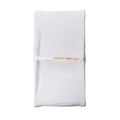 White change mat cover on a change pad on a white background. 
