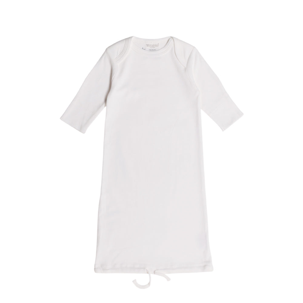 White cotton baby gown on a white background