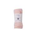 Pink baby swaddle blanket with a label on a white background