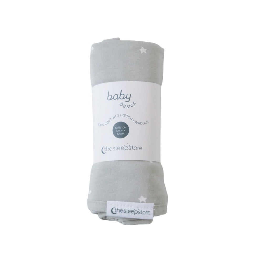Gray baby blanket with 'baby basics' label on a white background