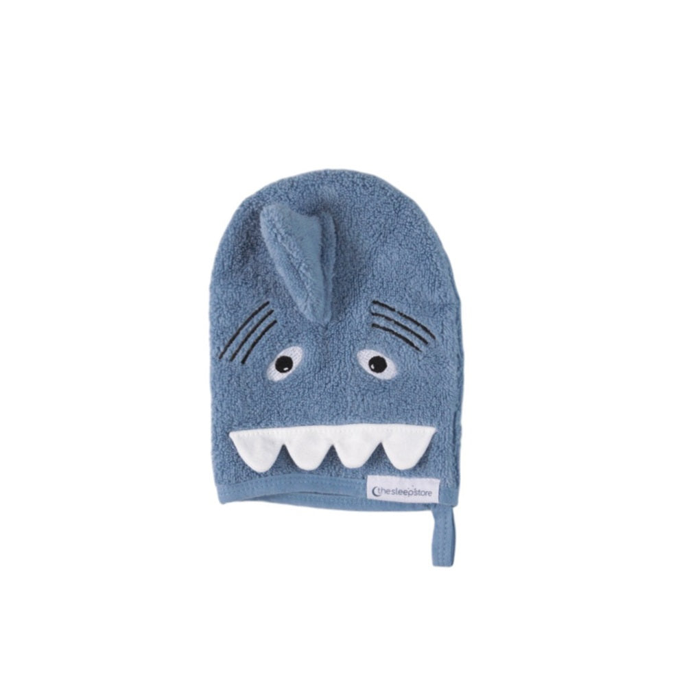 Blue shark-shaped bath mitt on a white background