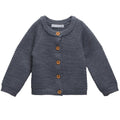 Grey merino wool seed stitch knitted cardigan with brown buttons on a white background