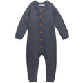 Grey merino wool knitted baby romper with brown button details on a white background