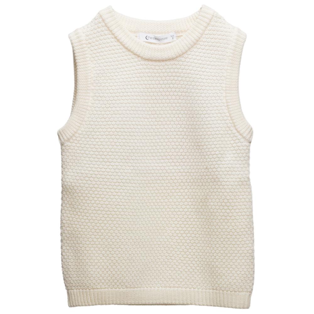 Cream knitted woolen vest on a white background