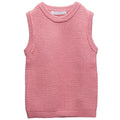Pink woolen knitted vest on a white background