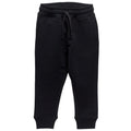 Black merino fleece jogger pants with an elastic drawstring waistband and ribbed ankle cuffs, shown flat on a white background.