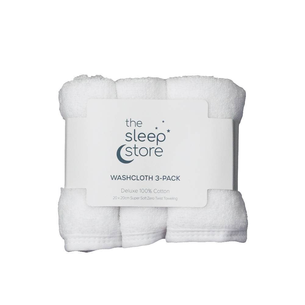 Pack of three white washcloths with 'The Sleep Store' branding on a white background