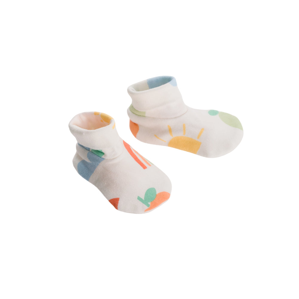 Rainbow Print Booties on a white background