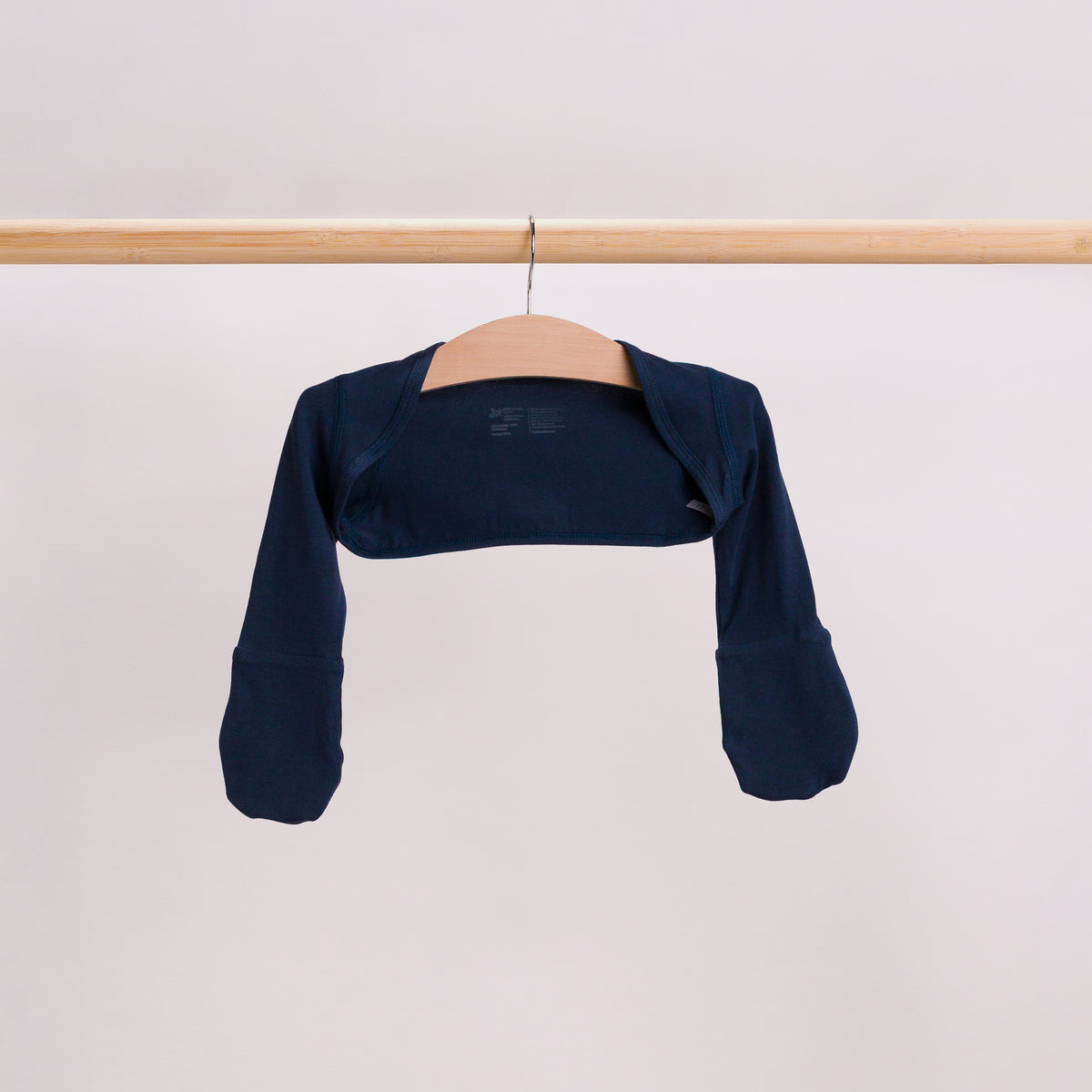 Hanging shot of stay on mittens in Navy. 