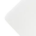 The corner of a mattress with a Natural colour fitted sheet, on a white background. 