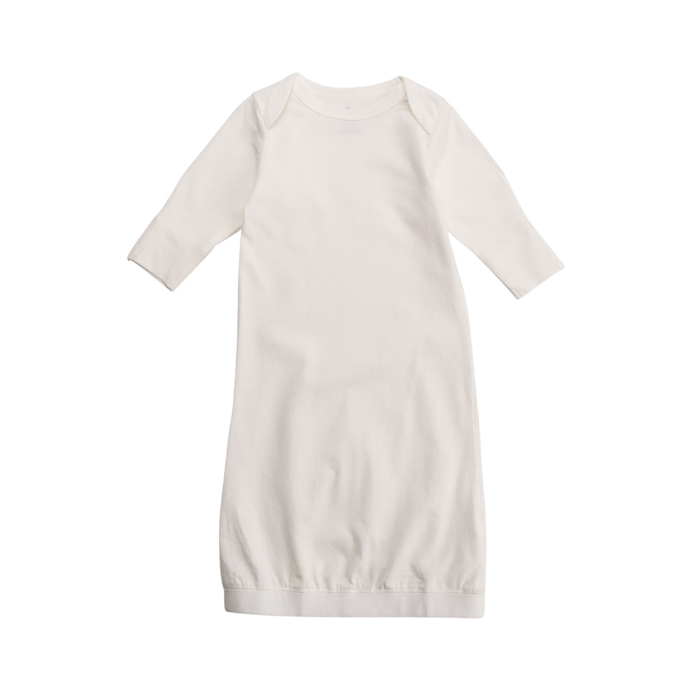 White cotton baby night gown with long sleeves on a white background