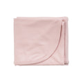 A Blush Pink baby swaddle wrap on a white background. 