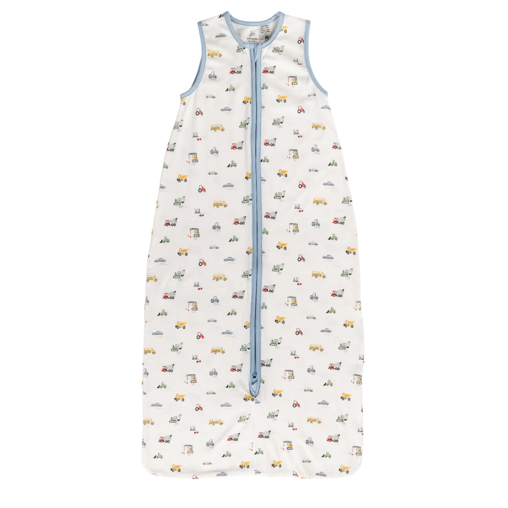 A sleeveless cotton baby sleep sack with cars and trucks on a white background, shown flat against a white background.