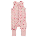 Pink baby sleepsuit with red strawberries on a white background