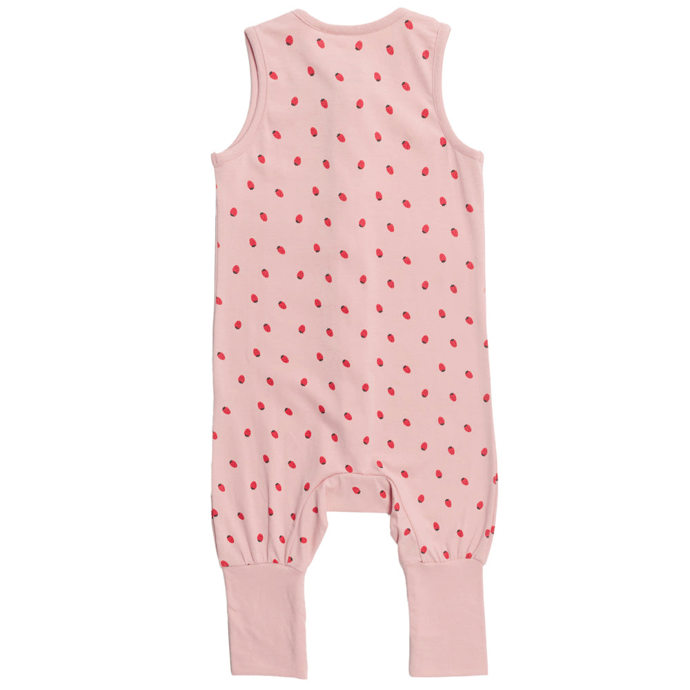Pink baby sleepsuit with red strawberries on a white background