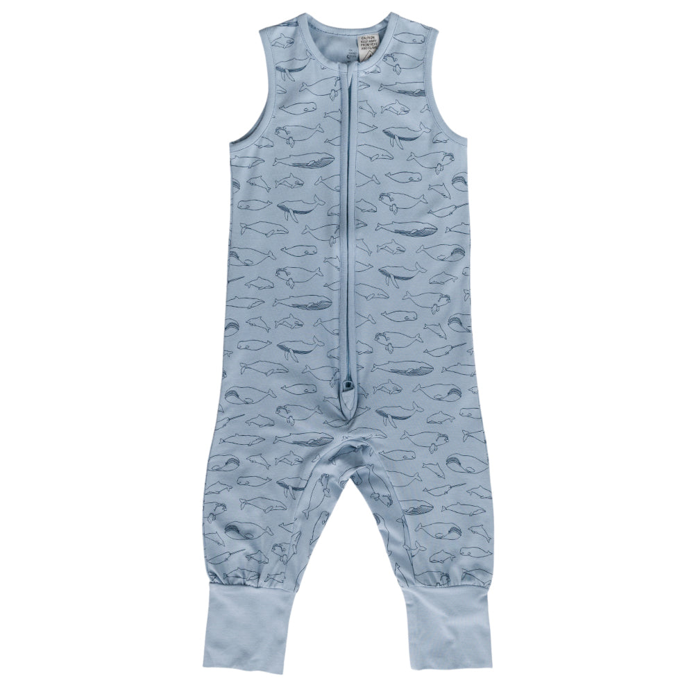 Light blue baby sleepsuit with whale pattern on a white background