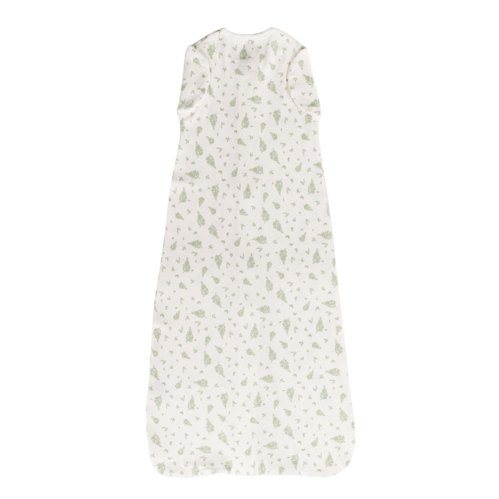 White organic cotton baby sleeping bag with green leaf pattern on a white background