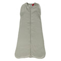 A baby swaddle bag in a light sage colour, on a white background. 