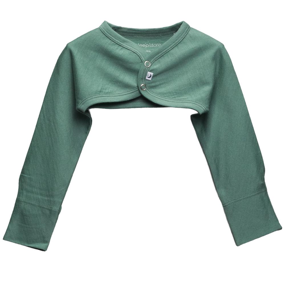 A sage green jersey merino long-sleeve baby bolero cardigan with a snap-button closure, laid flat on a white background.