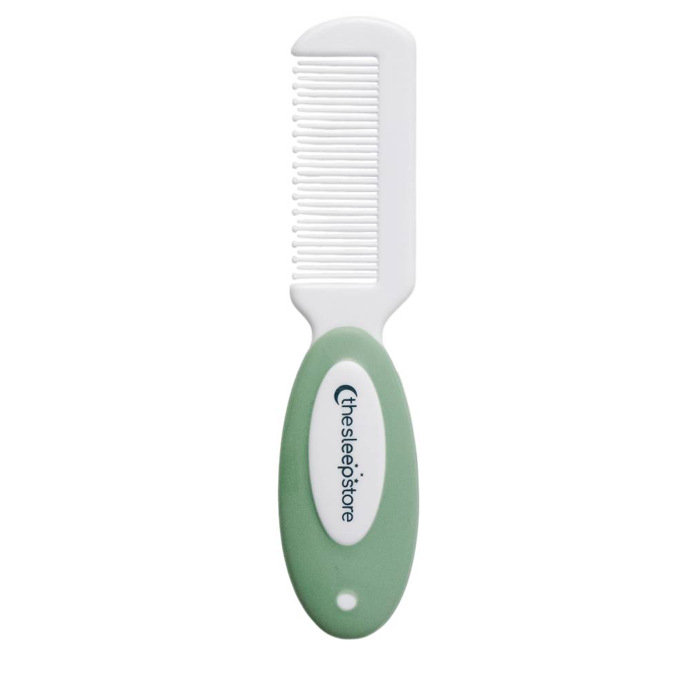 The sleep store white comb with green handle featuring 'thesleepstore' branding on a white background