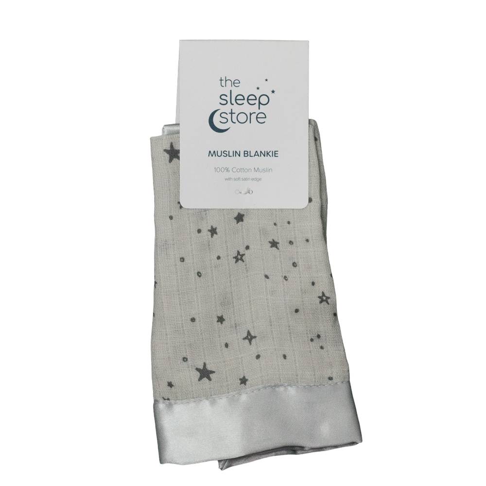 Muslin blanket with star pattern and 'The Sleep Store' label on a white background