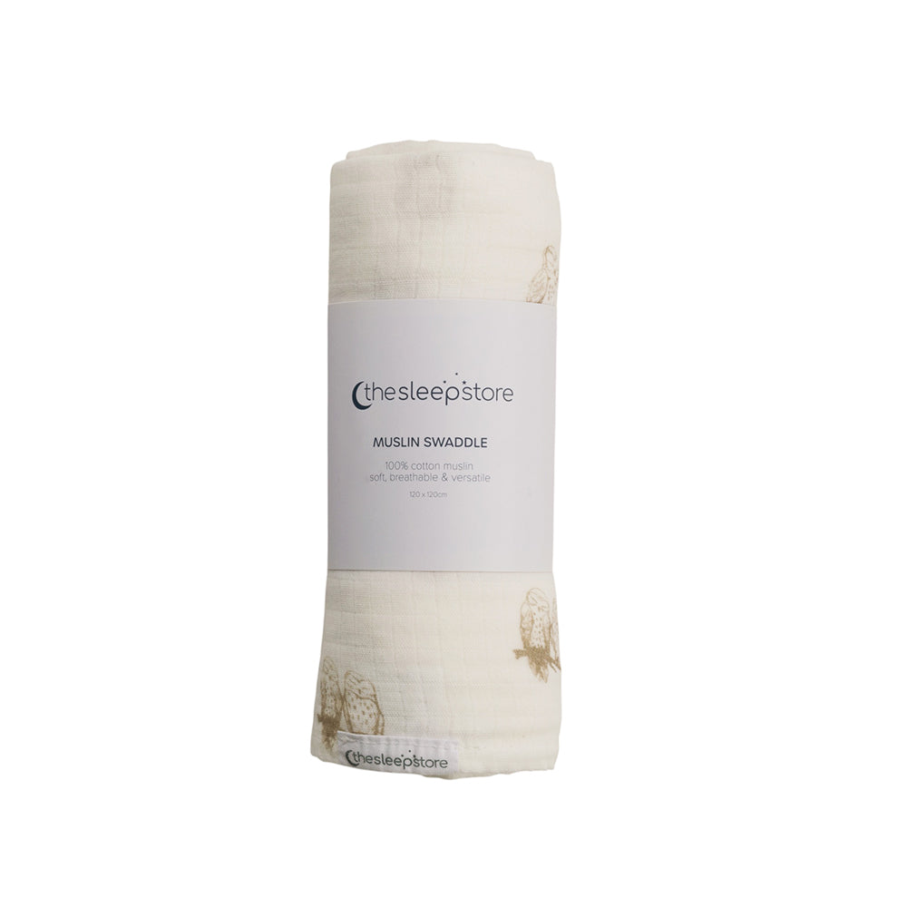 Muslin swaddle blanket with 'thesleepstore' label on a white background