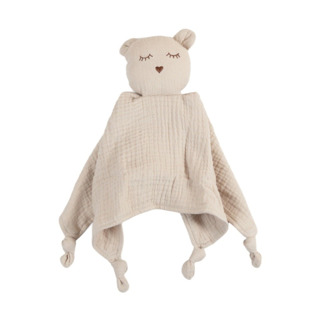 Beige bear-shaped comforter in a cotton muslin textured fabric on a white background