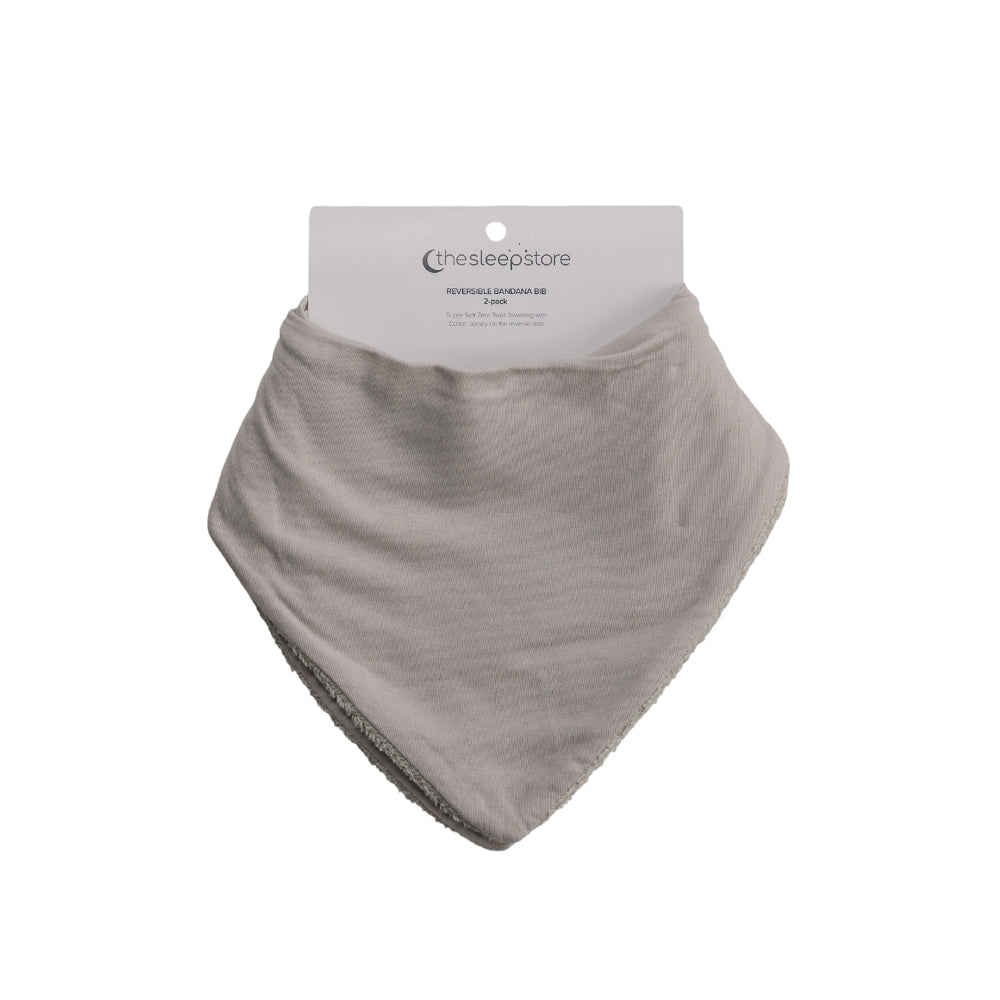 Gray baby bib with brand label on a white background