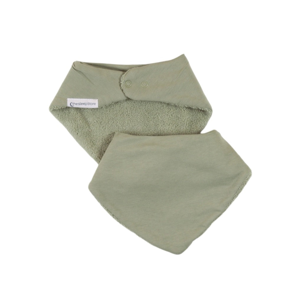 Two green baby bandana bibs on a white background