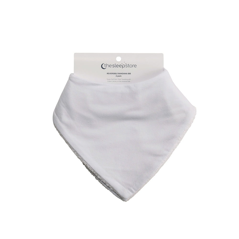 White baby bib on a white background with 'thesleepstore' label.