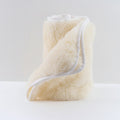 Wool underlay inner rolled on a white background