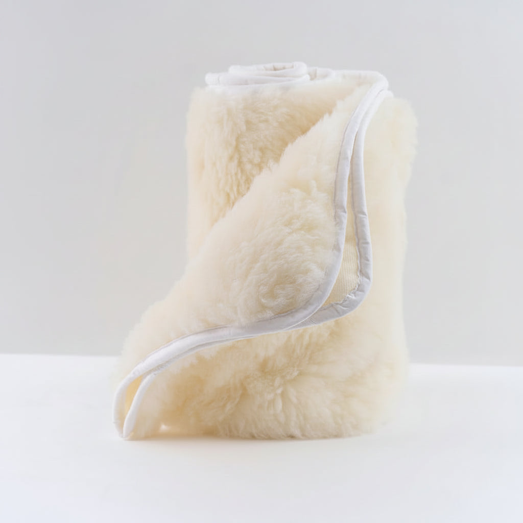 Wool underlay inner rolled on a white background