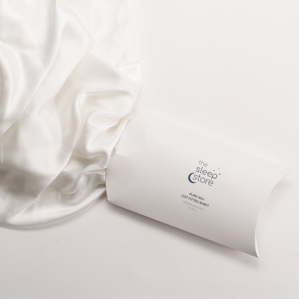 Ivory Fitted Sheet with 'The Sleep Store' branding on a light gray background
