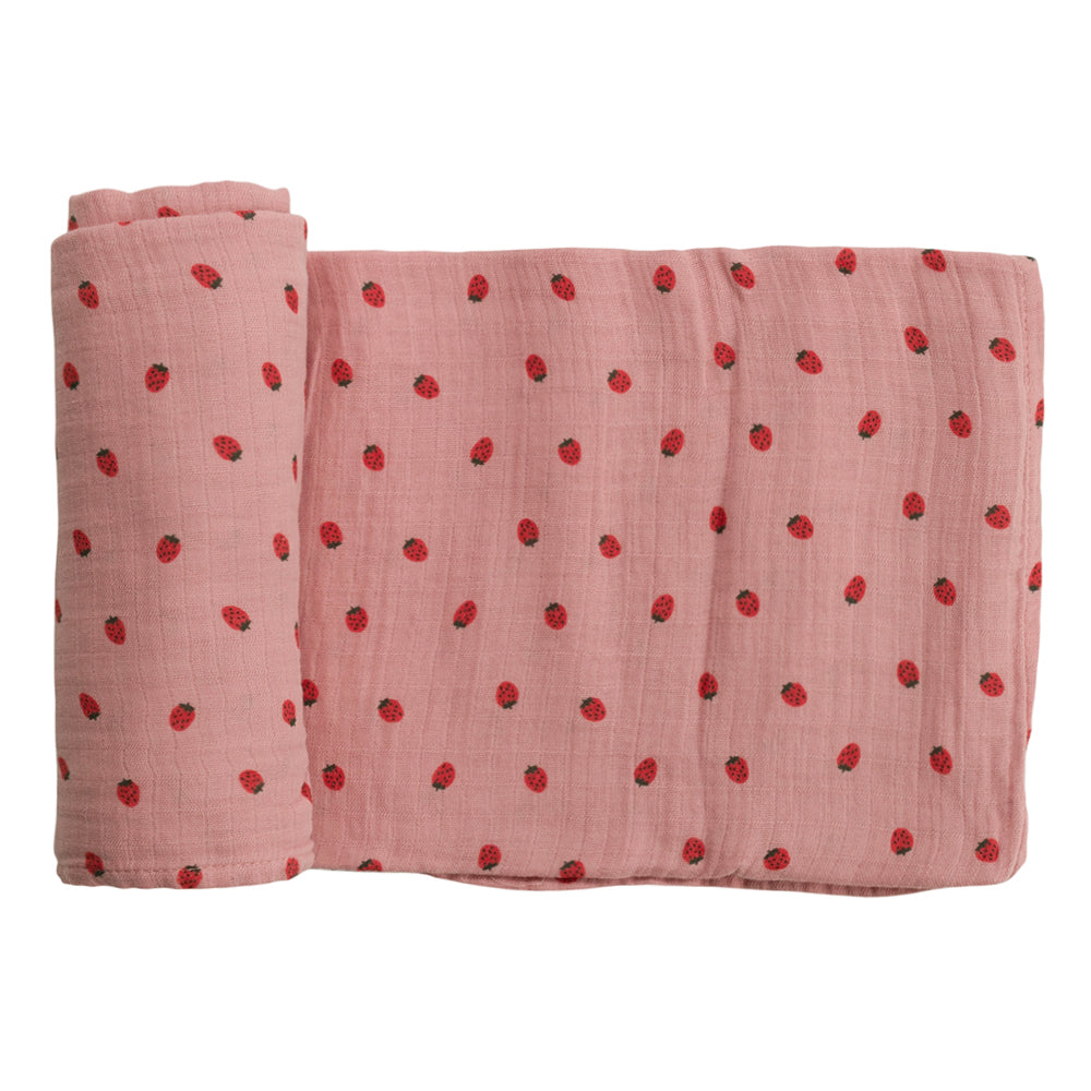 Pink swaddling wrap with little berry print on white background