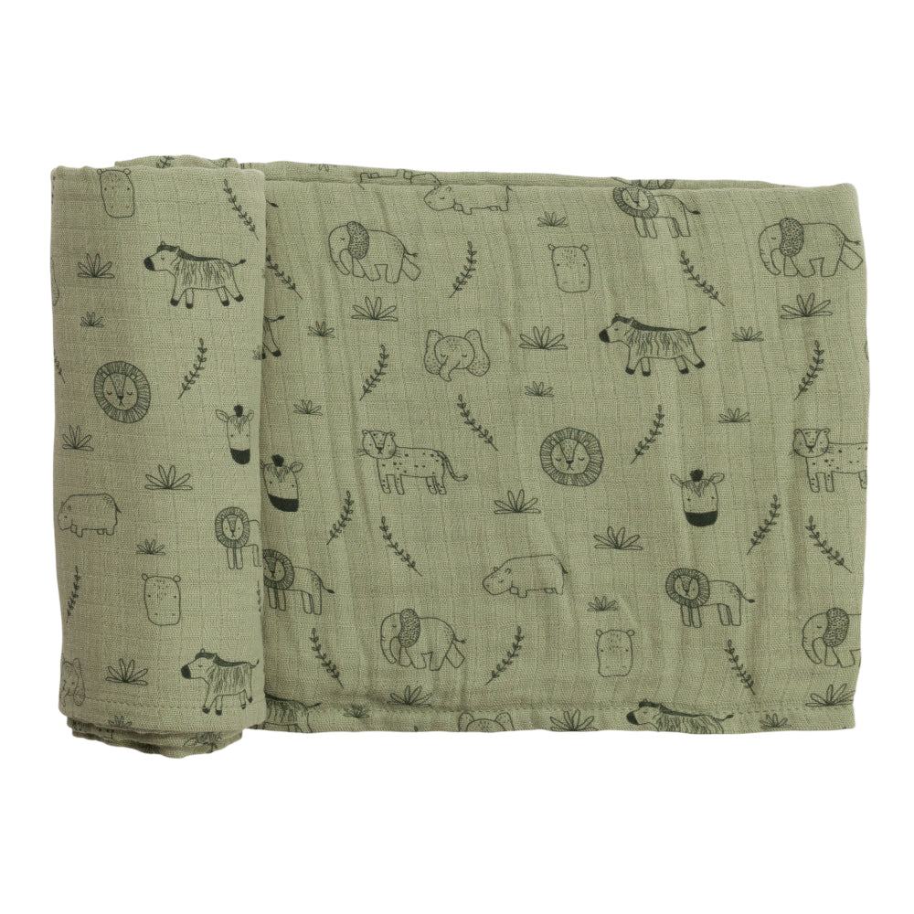 Folded muslin swaddling wrap with animal pattern on a white background